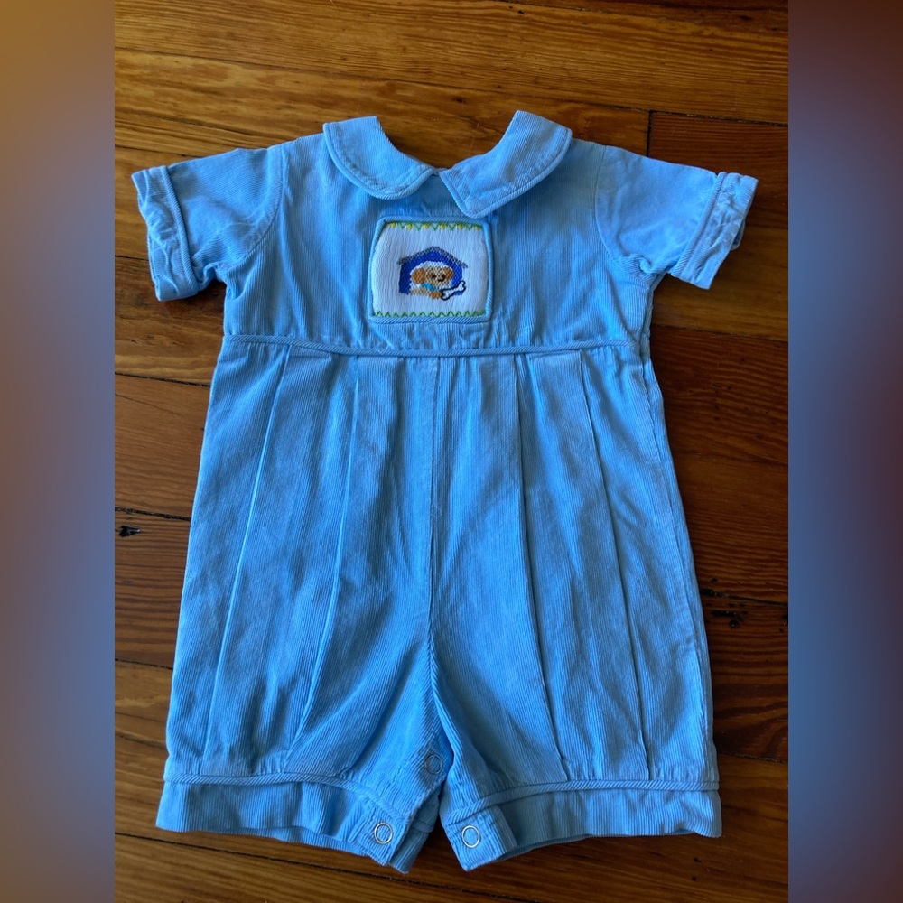 100% cotton baby blue smocked dog bubbler